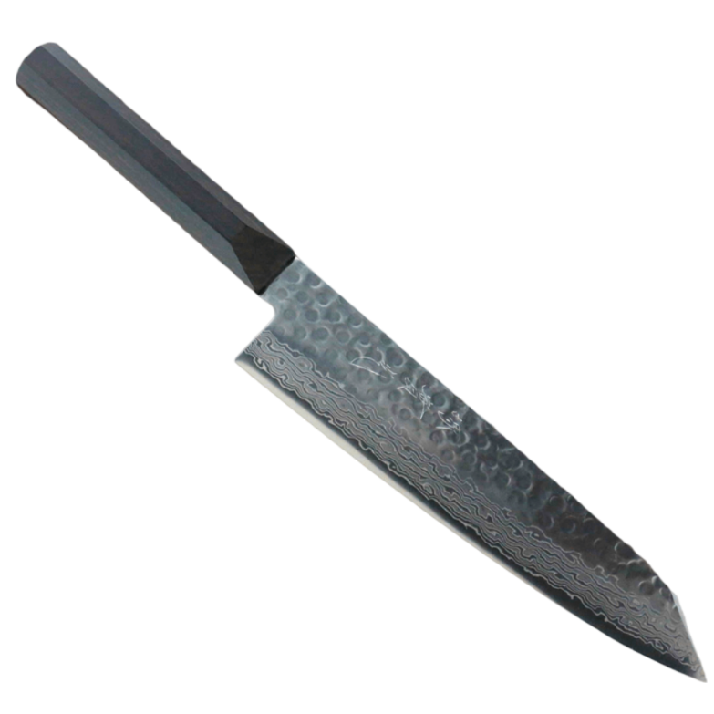 A knife with a black handle on a black background.