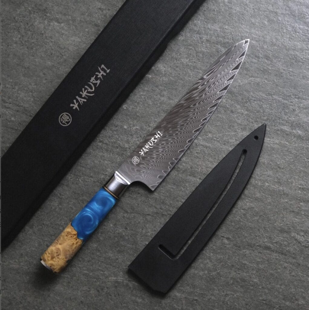 A knife with a blue handle and a black box.