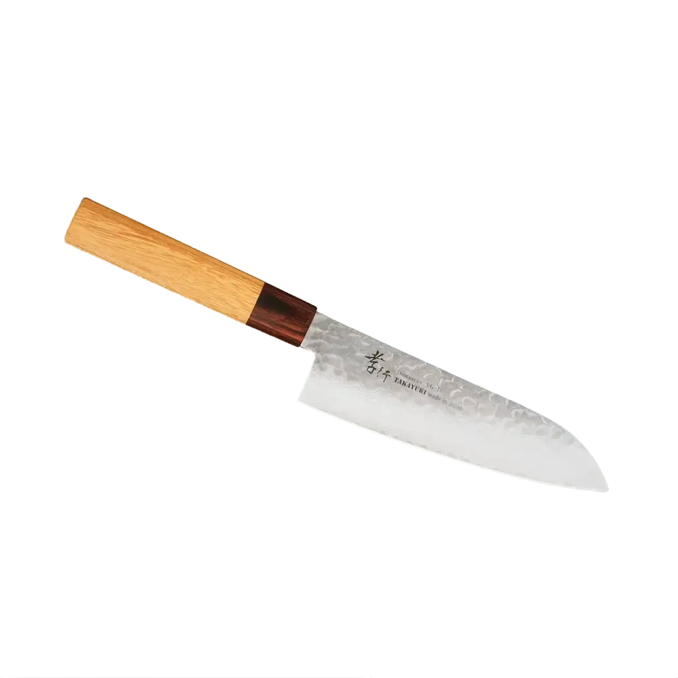 A Damascus santoku knife with a wooden handle on a brown background.